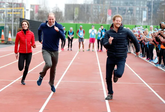 Britain's Prince William, second left, Kate, the Duchess of Cambridge, left, and Prince Harry take part in a relay race, during a training event to promote the charity Heads Together, at the Queen Elizabeth II Park in London, Sunday, February 5, 2017. (Photo by Alastair Grant/AP Photo) 