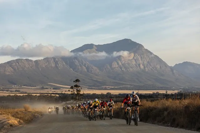 The elite men race during Stage 3 of the ABSA Cape Epic MTB race over 94km with 2100m of climbing in Wellington, South Africa, 20 March 2024. This year's event sees 600 teams tackle 617km kilometers with 16,500m of climbing over 8 days of riding. The race includes UCI pro riders and amateurs. (Photo by Kim Ludbrook/EPA/EFE)