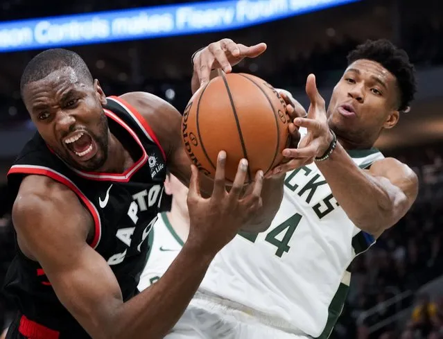 Milwaukee Bucks' Giannis Antetokounmpo tries to steal the ball from Toronto Raptors' Serge Ibaka during the second half of Game 2 of the NBA Eastern Conference basketball playoff finals Friday, May 17, 2019, in Milwaukee. The Bucks won 125-103 to take a 2-0 lead in the series. (Photo by Morry Gash/AP Photo)