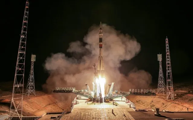 A Soyuz-FG rocket booster carrying the Soyuz MS-13 spacecraft with Roscosmos cosmonaut Alexander Skvortsov, NASA astronaut Andrew R Morgan, and European Space Agency (ESA) astronaut Luca Parmitano aboard lifts off to the International Space Station (ISS) from the Baikonur Cosmodrome in Kazakhstan on July 20, 2019. (Photo by Sergei Savostyanov/TASS )