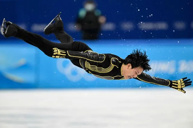 France's Adam Siao Him Fa competes in the men's single skating free skating of the figure skating event during the Beijing 2022 Winter Olympic Games at the Capital Indoor Stadium in Beijing on February 10, 2022. (Photo by Wang Zhao/AFP Photo)