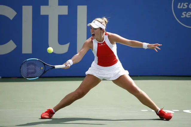 In this August 3, 2019, file photo, Caty McNally returns the ball during a semifinal match against Camila Giorgi, of Italy, at the Citi Open tennis tournament in Washington. McNally, who is only 17, teamed with Coco Gauff to win the U.S. Open junior doubles title a year ago and again to win a WTA doubles title at the Citi Open this August. Like Gauff, McNally received a wild-card invitation for the main draw of the U.S. Open, which starts next week. (Photo by Patrick Semansky/AP Photo/File)
