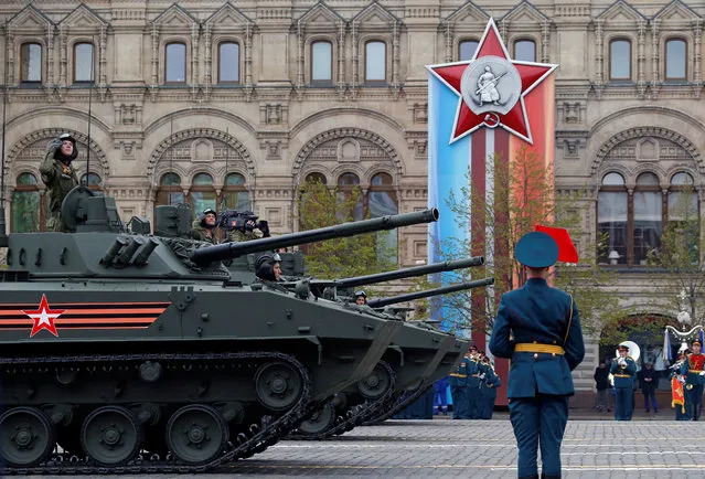 Russian servicemen parade with tanks during the 72nd anniversary of the end of World War II on the Red Square in Moscow, Russia on May 9, 2017. (Photo by Sergei Karpukhin/Reuters)