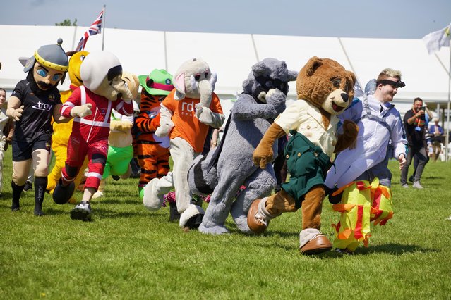 Fun-loving mascots from holiday attractions across Devon gathered on the last day of the Devon County Show held in Exeter, United Kingdom on May 20, 2023 for a speed showdown around the central display ring. Nearly 100,000 people are expected to have attended the three day event which finishes on Saturday. (Photo by Mark Passmore/Apex News)