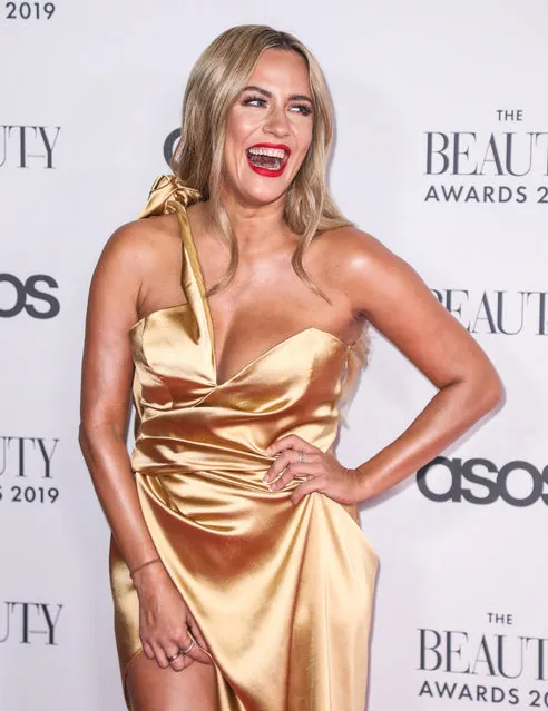 English radio and television presenter Caroline Flack attends The Beauty Awards 2019 on November 25, 2019 in London, England. (Photo by Splash News and Pictures)