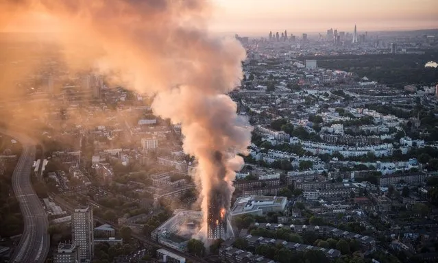 Aerial view of Grenfell Tower in London, Wednesday, June 14, 2017. (Photo by Jason Hawkes/jasonhawkes.com)