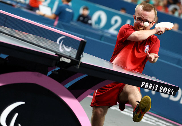 Thomas Bouvais of France in action during his men's singles table tennis match against Viktor Didukh of Ukraine on September 2, 2024. (Photo by Kacper Pempel/Reuters)