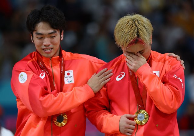 Gold medalists Yuto Sano of Japan and Haruki Torii of Japan celebrate on the podium at the men's goalball victory ceremony on day eight of the Paris 2024 Summer Paralympic Games at South Paris Arena on September 05, 2024 in Paris, France. (Photo by Kacper Pempel/Reuters)