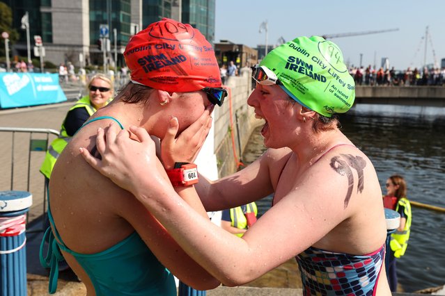 Jessica Purcell and Sarah Coughlan celebrate after placing first and second respectively in the women’s event of the Swim Ireland 104th Liffey Swim in Dublin on Saturday, September 7, 2024. (Photo by Ben Brady/Inpho)