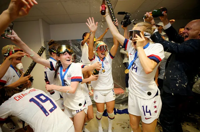 Players of the USA celebrate in the dressing room following their team's victory in the 2019 FIFA Women's World Cup France Final match between The United States of America and The Netherlands at Stade de Lyon on July 07, 2019 in Lyon, France. (Photo by Maddie Meyer – FIFA/FIFA via Getty Images)