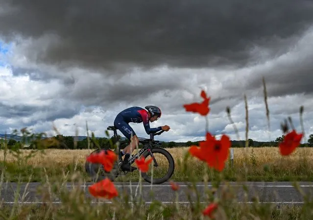 Ineos Grenadiers team's Belgian rider Laurens De Plus rides during the fourth stage of the 74th edition of the Criterium du Dauphine individual time trial cycling race, 31.9 km between Montbrison and La Batie d'Urfe, central eastern France, on June 8, 2022. (Photo by Marco Bertorello/AFP Photo)