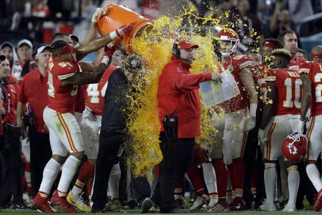Kansas City Chiefs head coach Andy Reid is doused on the sideline during the second half of the NFL Super Bowl 54 football game against the San Francisco 49ers Sunday, February 2, 2020, in Miami Gardens, Fla. (Photo by John Bazemore/AP Photo)