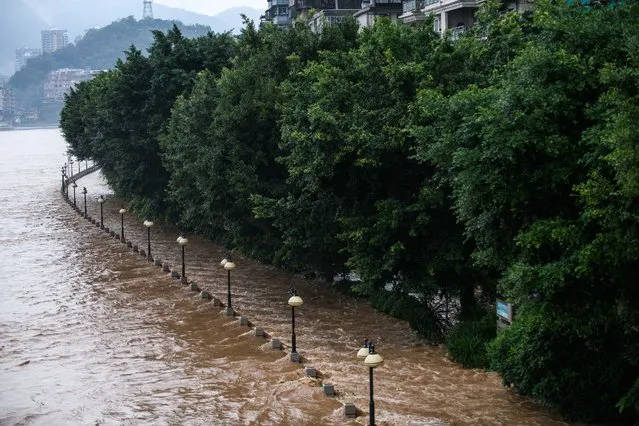 This picture shows a flooded area after heavy rains in Shaoguan in China's southern Guangdong province on June 21, 2022. (Photo by AFP Photo/China Stringer Network)