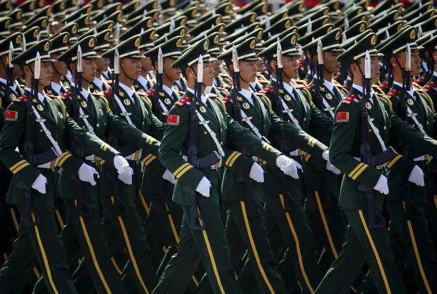 Paramilitary policemen march during the military parade marking the 70th anniversary of the end of World War Two, in Beijing, China, September 3, 2015. (Photo by Damir Sagolj/Reuters)