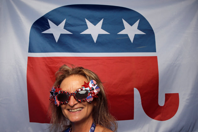 Virginia Macha, delegate from Kansas, poses for a photograph at the Republican National Convention in Cleveland, Ohio, United States July 19, 2016. Macha's message to the presidential nominee is: “Keep us safe. Give us jobs”. (Photo by Jim Young/Reuters)