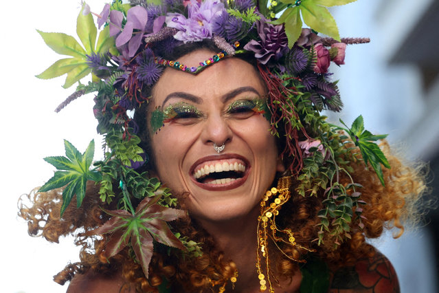 A reveler takes part in the unofficial kick off of Rio's Carnival with the weed block parade performance by “Bloco Planta na mente”, in Rio de Janeiro, Brazil on January 5, 2025. (Photo by Aline Massuca/Reuters)