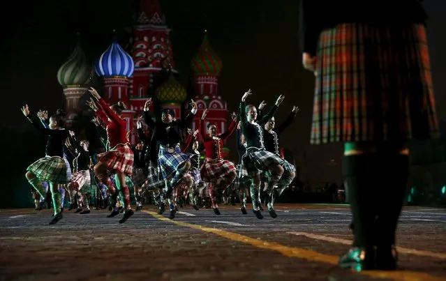 Members of the school of the Scottish Dance “Shady Glen” practice during a rehearsal for the “Spasskaya Tower” international military music festival at Moscow's Red Square, September 4, 2015. (Photo by Maxim Zmeyev/Reuters)