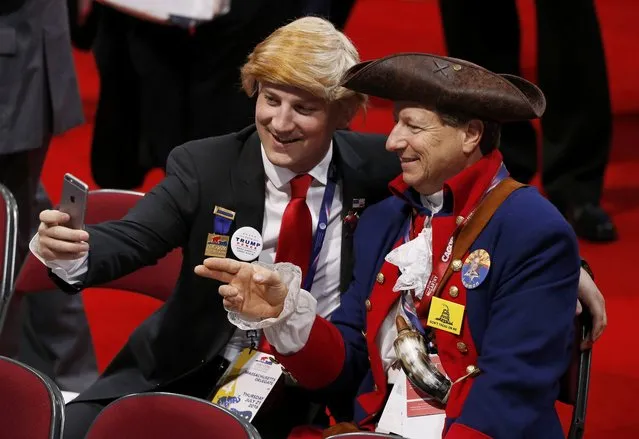 Delegates dressed as Donald Trump and an American Revolution soldier take a selfi at the Republican National Convention in Cleveland, Ohio, U.S. July 21, 2016. (Photo by Mario Anzuoni/Reuters)