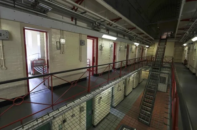The cell (L) of former inmate Oscar Wilde, who was gaoled for gross indecency with another man, is seen at the former Reading prison, in Reading, Britain September 1, 2016. (Photo by Eddie Keogh/Reuters)