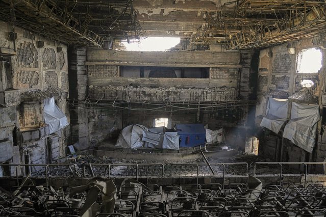 Tents for displaced Palestinians are set up in the auditorium of the Islamic University, damaged by an Israeli bombardment, in Gaza City, Saturday, April 5, 2025. (Photo by Jehad Alshrafi/AP Photo)