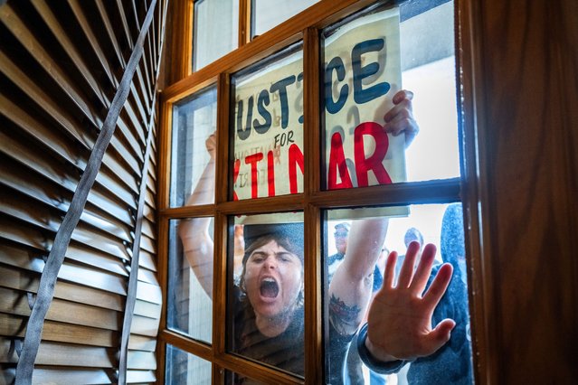 Protesters chant outside the room in which congressman Andy Ogles holds a press conference for the Stop the Invasion: Protect Tennessee anti-immigration campaign in Nashville, US on May 26, 2025. (Photo by Laura Thompson/Rex Features/Shutterstock)