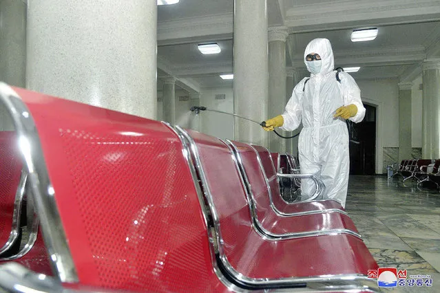 In this undated photo provided on Saturday, August 29, 2020, by the North Korean government, an employee disinfects the inside of Pyongyang Station to protect against the coronavirus in Pyongyang, North Korea. Independent journalists were not given access to cover the event depicted in this image distributed by the North Korean government. The content of this image is as provided and cannot be independently verified. Korean language watermark on image as provided by source reads: “KCNA” which is the abbreviation for Korean Central News Agency. (Photo by Korean Central News Agency/Korea News Service via AP Photo)