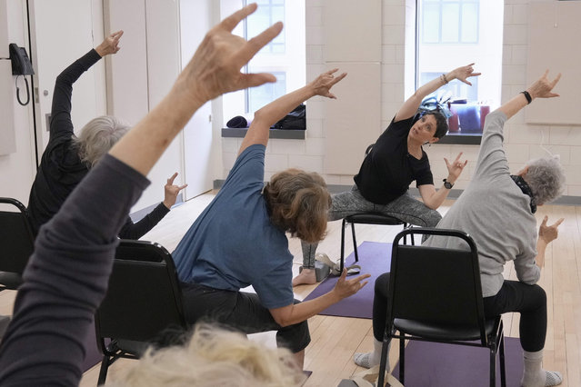 Whitney Chapman, right, conducts a chair yoga class at the Marlene Meyerson JCC Manhattan, in New York, March 28, 2025. (Photo by Richard Drew/AP Photo)