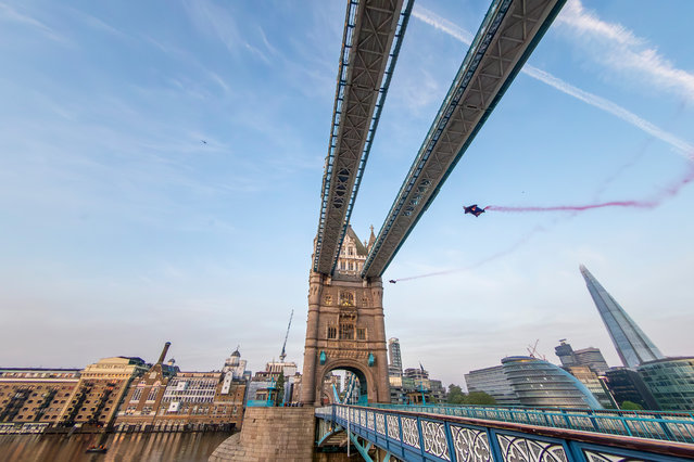 Marco Fuerst and Marco Waltenspiel of Austria fly through Tower Bridge in London, Great Britain on May, 12, 2024. (Photo by Peter Salzmann/Red Bull Content Pool)