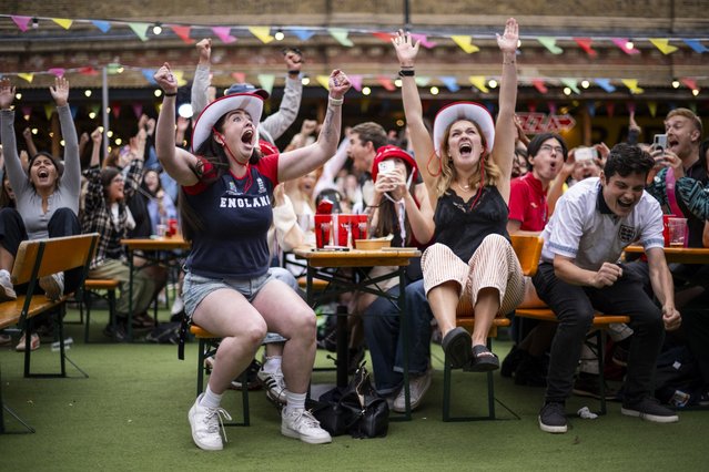 England fans celebrate as Chloe Kelly scores the winning penalty as they watch the UEFA Women's EURO 2025 Final between England and Spain at the Vinegar Yard on July 27, 2025 in London, United Kingdom. (Photo by Justin Setterfield/Getty Images)