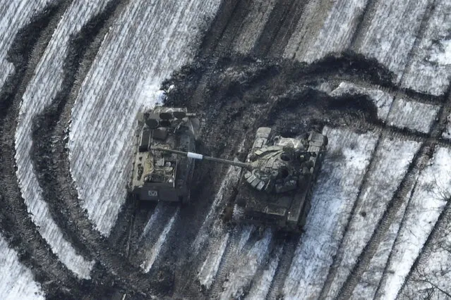In this image from Ukrainian Armed Forces and taken in February 2023 shows damaged Russian tanks in a field after attempting to attack, Vuhledar, Ukraine. The battle for the small coal-mining town of Vuhledar on Ukraine's eastern front line which has emerged as a critical hot spot in the fight for Donetsk province. Securing the town would give both Ukrainian forces and Russian troops a tactical upper hand in the greater battle for the Donbas region. (Photo by Ukrainian Armed Forces via AP Photo)
