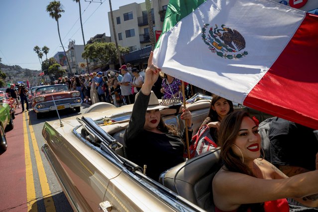 People take part in a lowrider parade celebrating lowriding culture and supporting immigration, in San Francisco, California, U.S., September 20, 2025. (Photo by Manuel Orbegozo/Reuters)