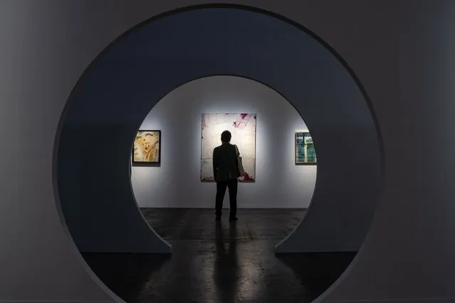 A visitor attends the preview day of Art Basel Hong Kong at the Hong Kong Convention and Exhibition Centre on March 21, 2023 in Hong Kong, China. (Photo by Anthony Kwan/Getty Images)