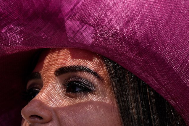 A spectator watches the seventh race of the day before the 156th running of the Belmont Stakes horse race, Saturday, June 8, 2024, in Saratoga Springs, N.Y. (Photo by Julia Nikhinson/AP Photo)