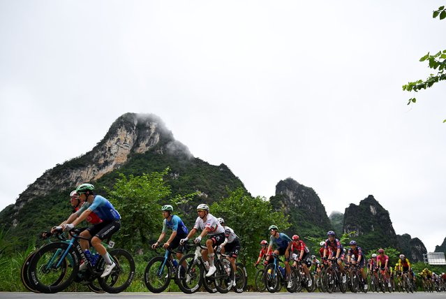 (L-R) Pierre Gautherat of France and Team Decathlon AG2R La Mondiale, Ivo Oliveira of Portugal and UAE Team Emirates - XRG, Gianluca Pollefliet of Belgium and Team Decathlon AG2R La Mondiale and a general view of the peloton competing during the 6th Gree-Tour Of Guangxi 2025, Stage 2 a 178.9km stage from Chongzuo to Jingxi 741m on October 15, 2025 in Jingxi, China. (Photo by Tim de Waele/Getty Images)