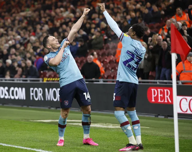 Burnley's Connor Roberts celebrates scoring their side's second goal of the game with team-mate Nathan Tella during the Sky Bet Championship match at the Riverside Stadium, Middlesbrough on Friday, April 7, 2023. (Photo by Richard Sellers/PA Images via Getty Images)