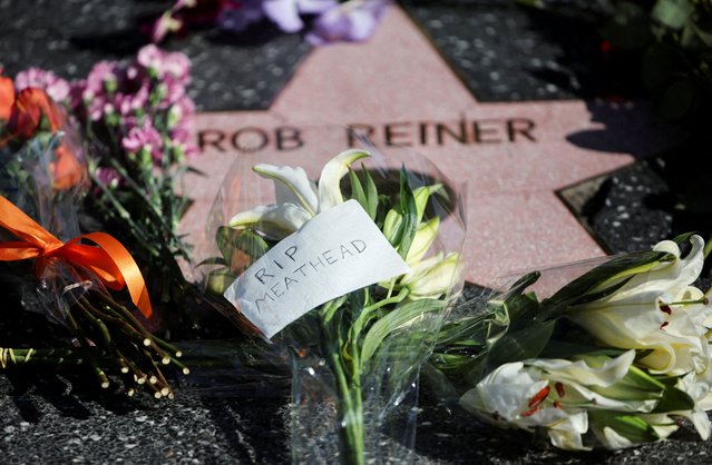 Flowers and a note reading 'rip meathead' are placed at Rob Reiner's star on the Hollywood Walk of Fame after the actor-director and political activist and his wife were found dead, in Los Angeles, California, U.S., December 15, 2025. (Photo by Daniel Cole/Reuters)