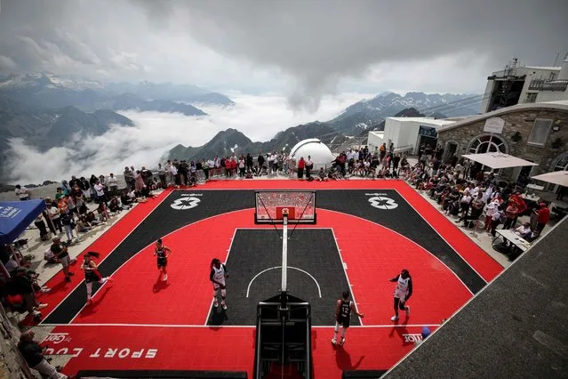 Players of the French women's 3X3 basketball team perform an exhibition match at the top of the Pic du Midi, in La Mongie, southwestern France, on June 27, 2023. (Photo by Valentine Chapuis/AFP Photo)