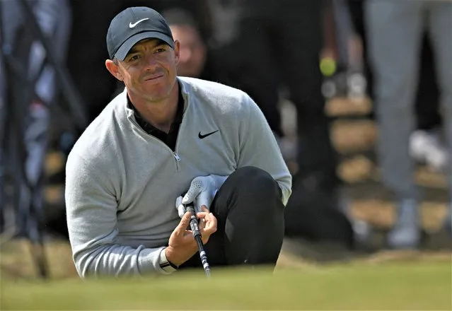 Northern Ireland's Rory McIlroy reacts after drining off the 15th tee on day two of the 151st British Open Golf Championship at Royal Liverpool Golf Course in Hoylake, north west England on July 21, 2023. The 151st Open at The Royal Liverpool Golf Course is set to run until July 23. (Photo by Glyn Kirk/AFP Photo)