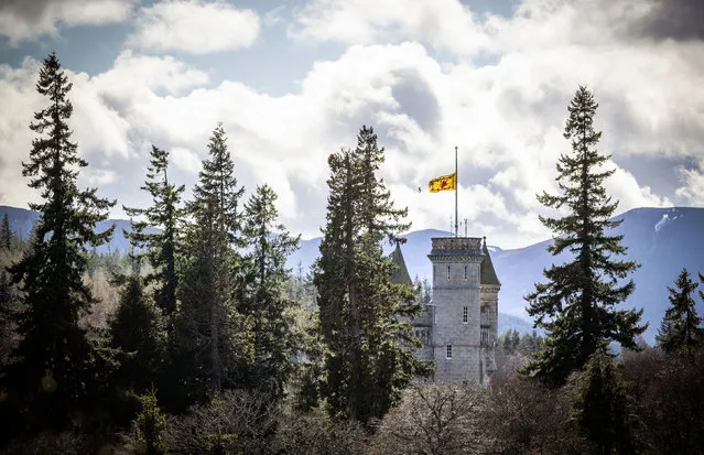 The Lion rampant flies at half mast at Balmoral Castle following the announcement of the death of Britain's Prince Philip, in Aberdeenshire, Scotland, Friday, April 9, 2021. (Photo by Jane Barlow/PA Wire via AP Photo)