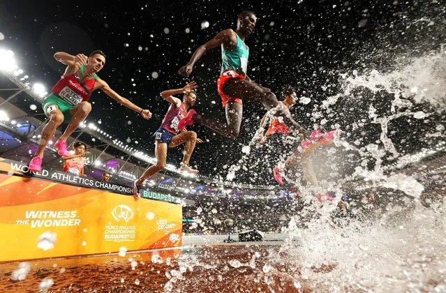 Athletes jump through the water in the Men's 3000m Steeplechase Final during day four of the World Athletics Championships Budapest 2023 at National Athletics Centre on August 22, 2023 in Budapest, Hungary. (Photo by Patrick Smith/Getty Images)