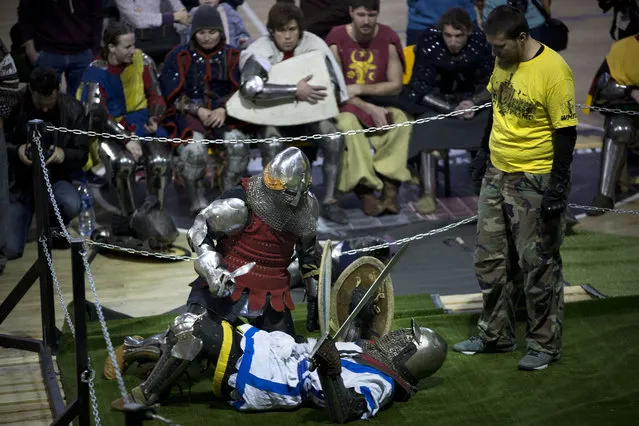 Two competitors take part in the World Medieval Fighting Championship WMFC – Israeli challenge, in Tel Aviv, Israel, Saturday, January 23, 2016. In the annual medieval-style tournament every fight is made up of  three rounds of two minutes. (Photo by Oded Balilty/AP Photo)