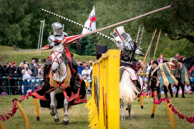Participants take part in the annual “Spectacular Jousting” tournament at Linlithgow Palace, West Lothian, Scotland on Saturday, July 2, 2022. (Photo by Jane Barlow/PA Images via Getty Images)