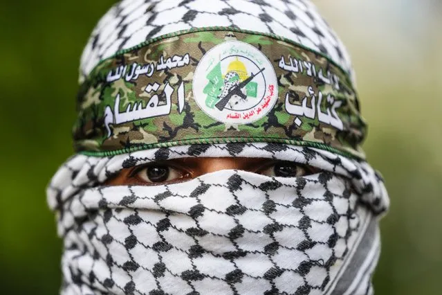 A Palestinian living in Lebanon chants slogans against France and French President Emmanuel Macron as he takes part in a protest in front of the French embassy in solidarity with Palestinians in Gaza, in Beirut, Lebanon, Monday, October 16, 2023. The Arabic on the headband reads: “No God but Allah and Muhammed is his messenger, al-Qassam Brigades”. (Photo by Hassan Ammar/AP Photo)