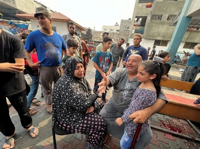 Palestinians react at the damages at a UN-run school sheltering displaced people, following an Israeli strike, in Jabalia in the northern Gaza Strip on November 2, 2023. (Photo by Fadi Whadi/Reuters)