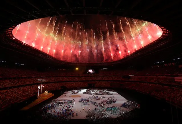 Fireworks explode during the opening ceremony of the Tokyo 2020 Paralympic Games at the Olympic Stadium on August 24, 2021 in Tokyo, Japan. (Photo by Molly Darlington/Reuters)