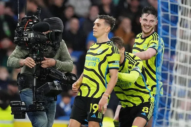 Arsenal's Leandro Trossard celebrates scoring their side's third goal of the game during the Premier League match at Amex Stadium, Brighton, UK on Saturday, April 6, 2024. (Photo by Gareth Fuller/PA Images via Getty Images)
