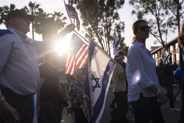 Pro-Israel supporters march outside the University of Southern California campus in Los Angeles, Wednesday, May 8, 2024. (Photo by Jae C. Hong/AP Photo)