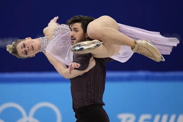 Madison Hubbell and Zachary Donohue, of the United States, perform their routine in the ice dance competition during the figure skating at the 2022 Winter Olympics, Monday, February 14, 2022, in Beijing. (Photo by David J. Phillip/AP Photo)