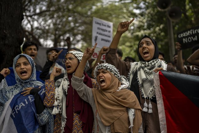 Student activists shout slogans against the war in Gaza and to show solidarity with the people of Palestine during a protest in New Delhi, India, Saturday, June 1, 2024. (Photo by Altaf Qadri/AP Photo)