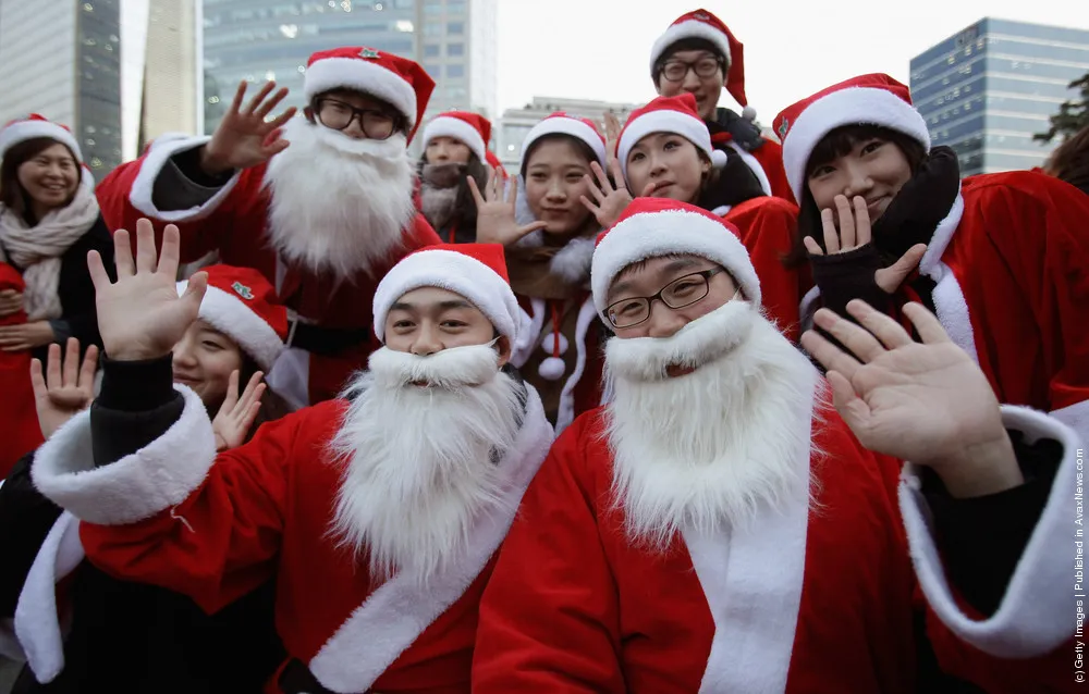 South Koreans Dressed As Santa Hit The Streets Of Seoul